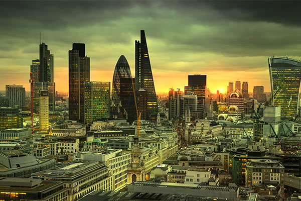 City of London skyline with the Sun dipping on the horizon